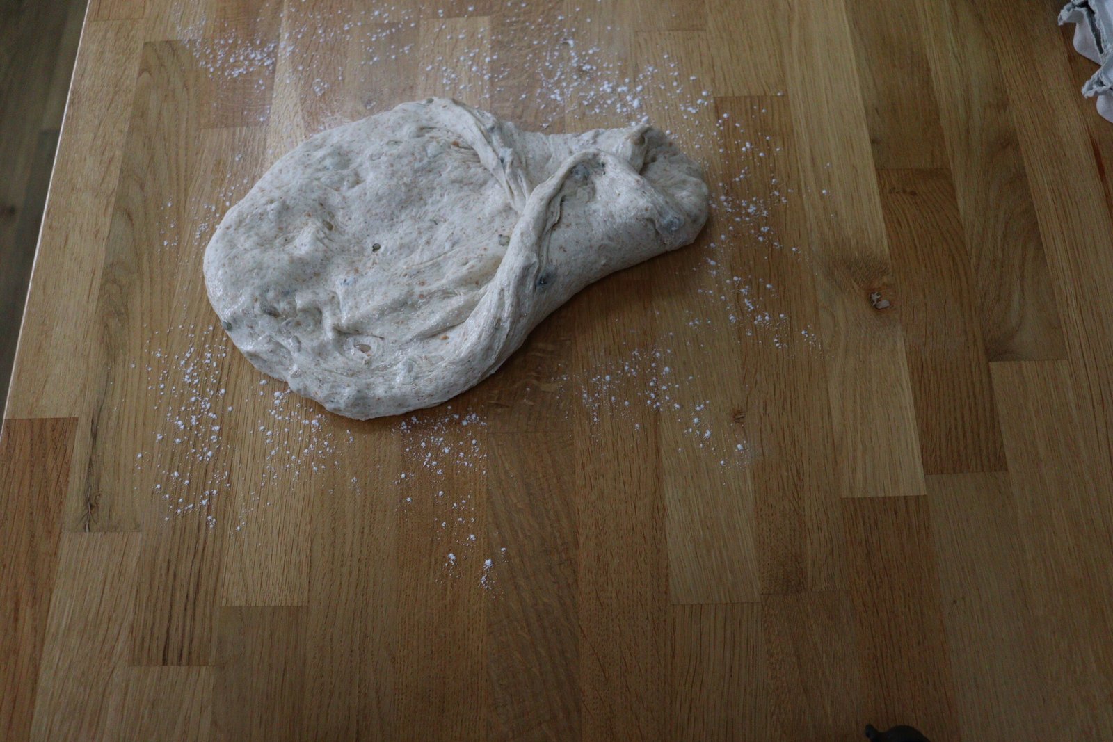 Flatten dough and fold long edge to centre